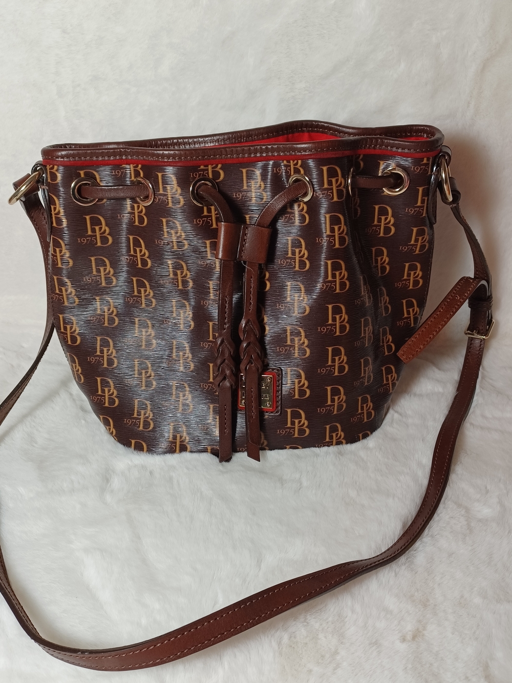 Dooney & Bourke Brown Monogram Drawstring Bucket Crossbody